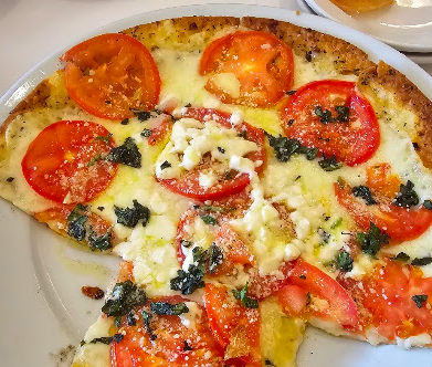Brio Italian Grille signature dishes Margherita Flatbread
Grilled Salmon Fresca
Center-Cut Filet Mignon
